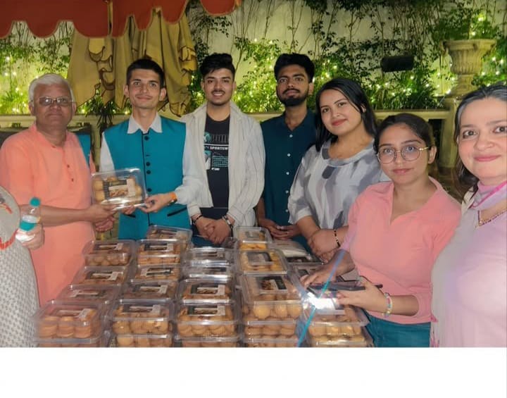 The Shudhttam team with Padma Shri Dr. Khadar Vali and trays of packaged products